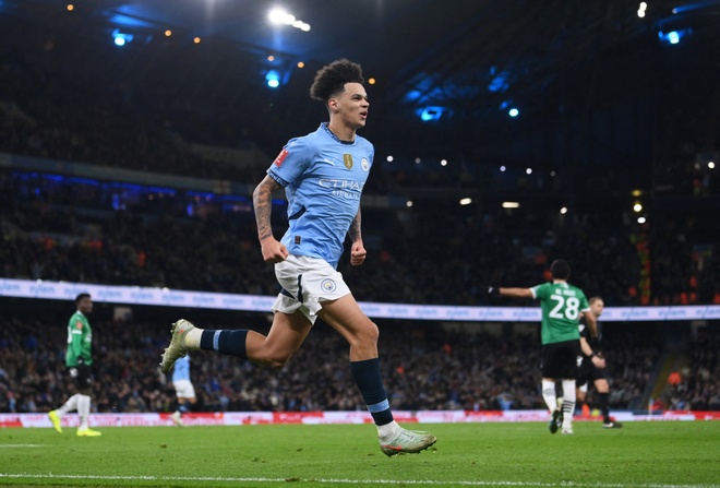 Man City dau Plympouth anh 5
